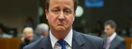 David Cameron frowning