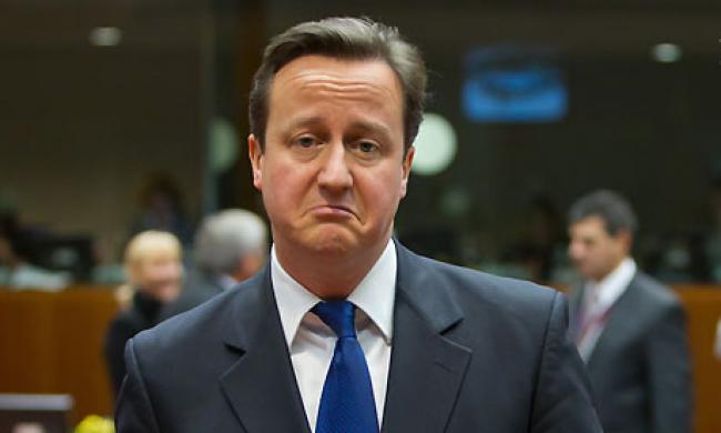 David Cameron frowning